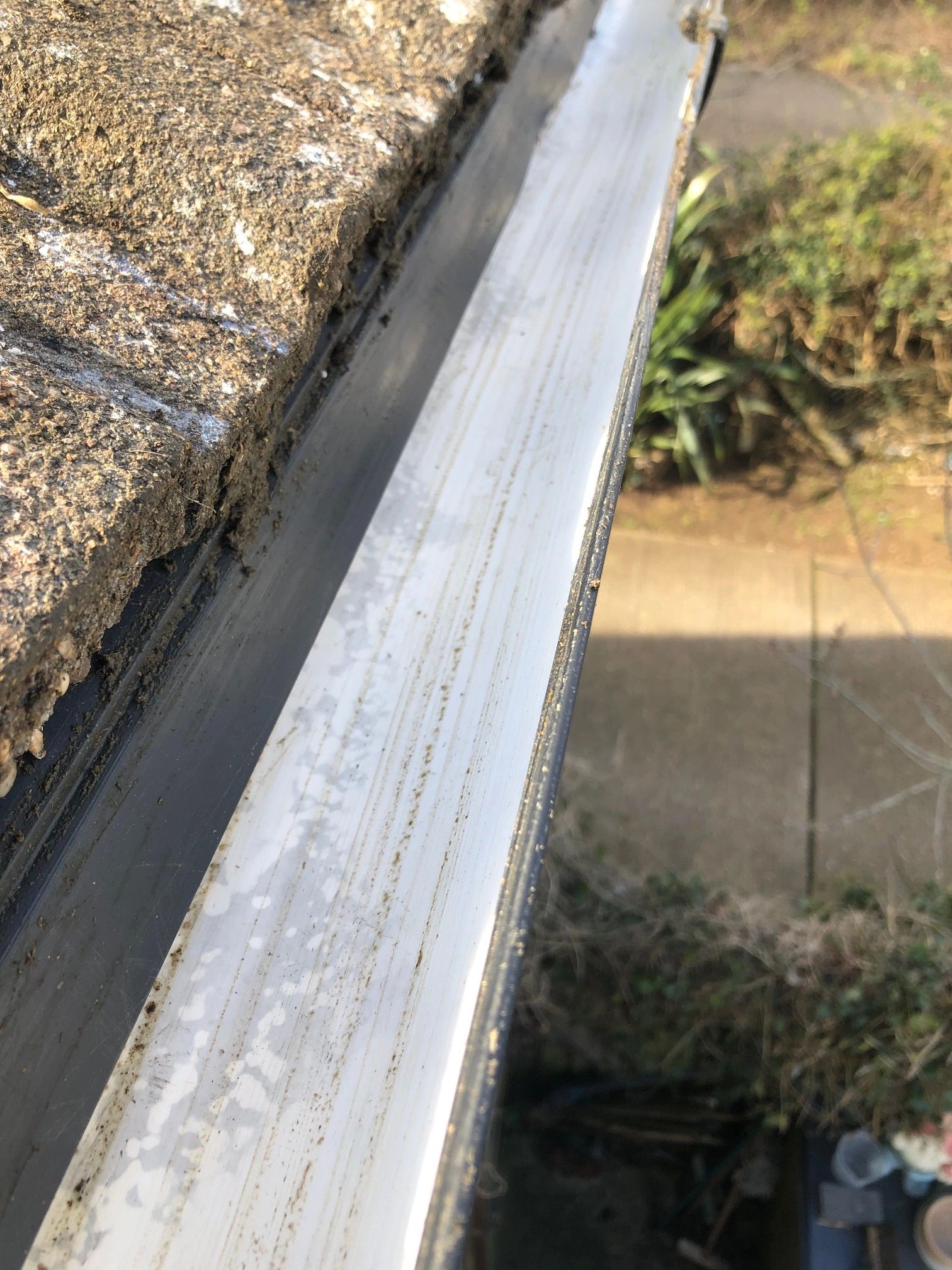 Weathered metal gutter drainage channel